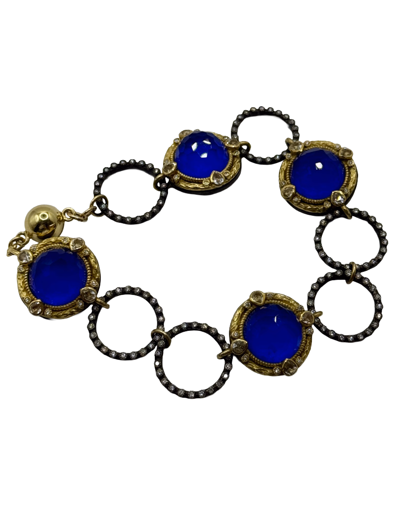 Armenta sterling silver and 18K gold bracelet with diamonds and blue gemstones, approximately 7.5 inches long.